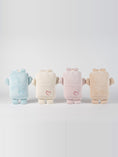 Load image into Gallery viewer, Bippie in four colorways: Cannoli Cream, Pastel Blue, Pink Marshmallow, Lamb's Wool, back, on white
