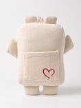 Load image into Gallery viewer, Bippie comfort companion in Cannoli Cream, back, on white
